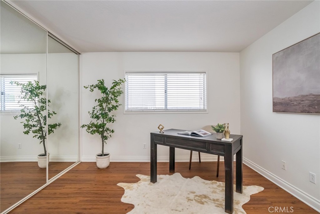29033 Shadow Valley Lane Saugus, CA 91390 - Photo 46 of 73 a workspace with furniture window and wooden floor