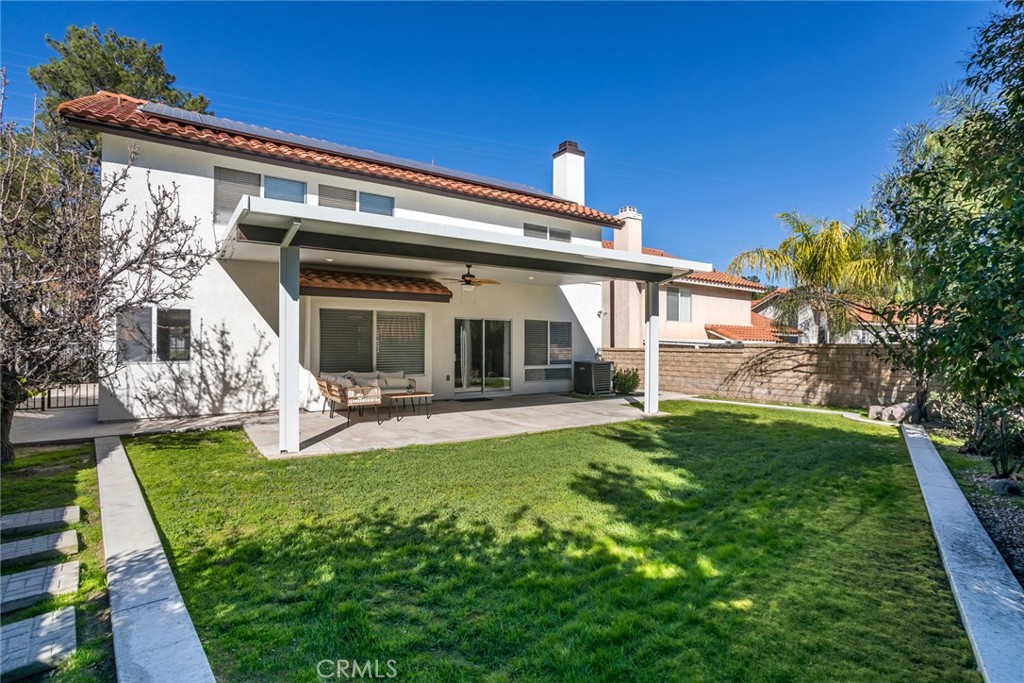 29033 Shadow Valley Lane Saugus, CA 91390 - Photo 55 of 73 a front view of a house with a garden