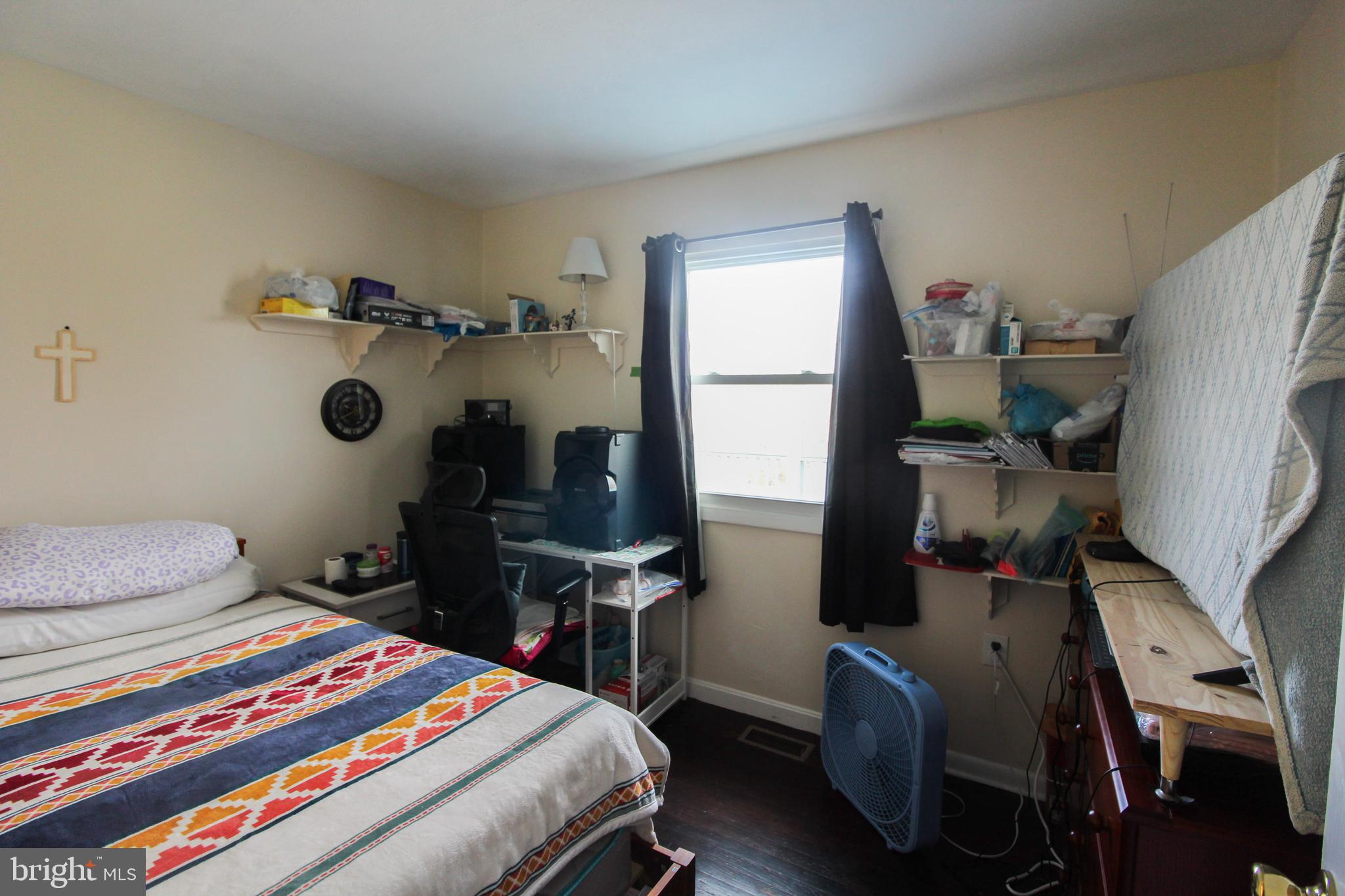 2212 Swartz Road Woodstock, VA 22664 - Photo 14 of 21 a bedroom with a bed and a desk