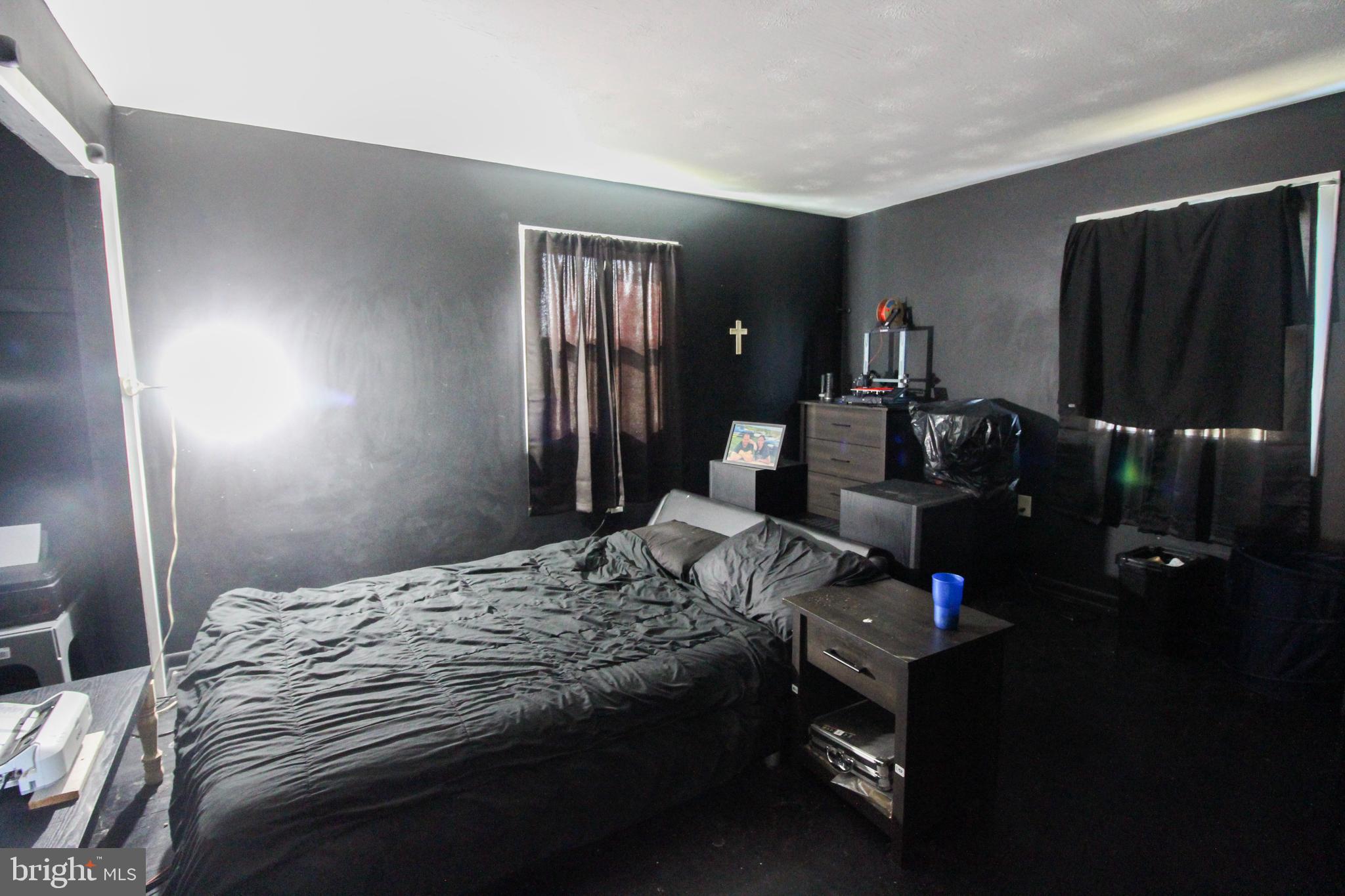 2212 Swartz Road Woodstock, VA 22664 - Photo 17 of 21 a bedroom with a bed and dresser