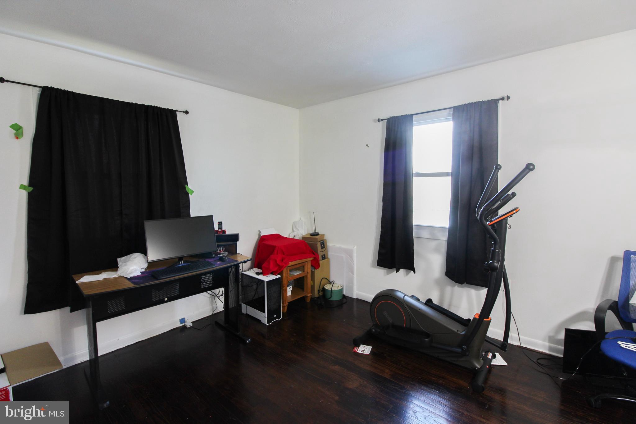 2212 Swartz Road Woodstock, VA 22664 - Photo 20 of 21 a living room with furniture and wooden floor
