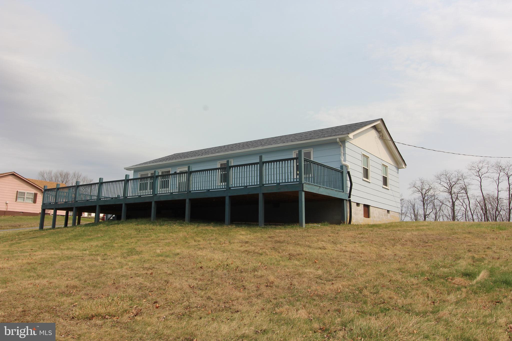2212 Swartz Road Woodstock, VA 22664 - Photo 3 of 21 a view of a house with a yard and sitting area