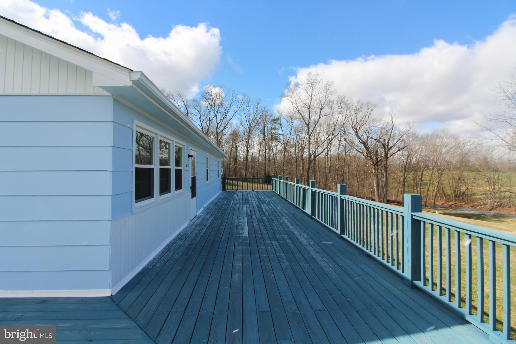2212 Swartz Road Woodstock, VA 22664 - Photo 6 of 21 a view of a house with a deck