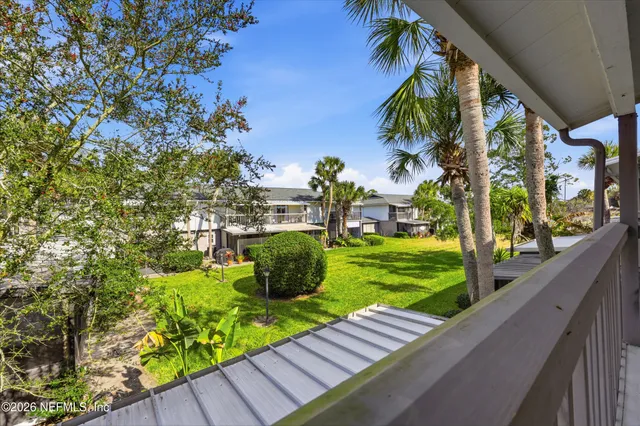 a view of a yard with an outdoor space