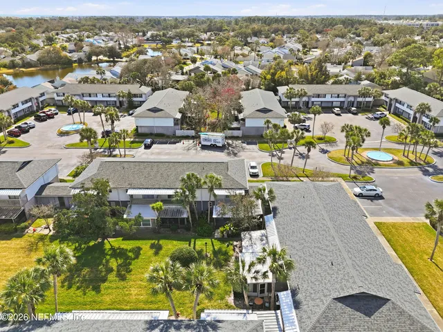 an aerial view of a city with lots of residential buildings
