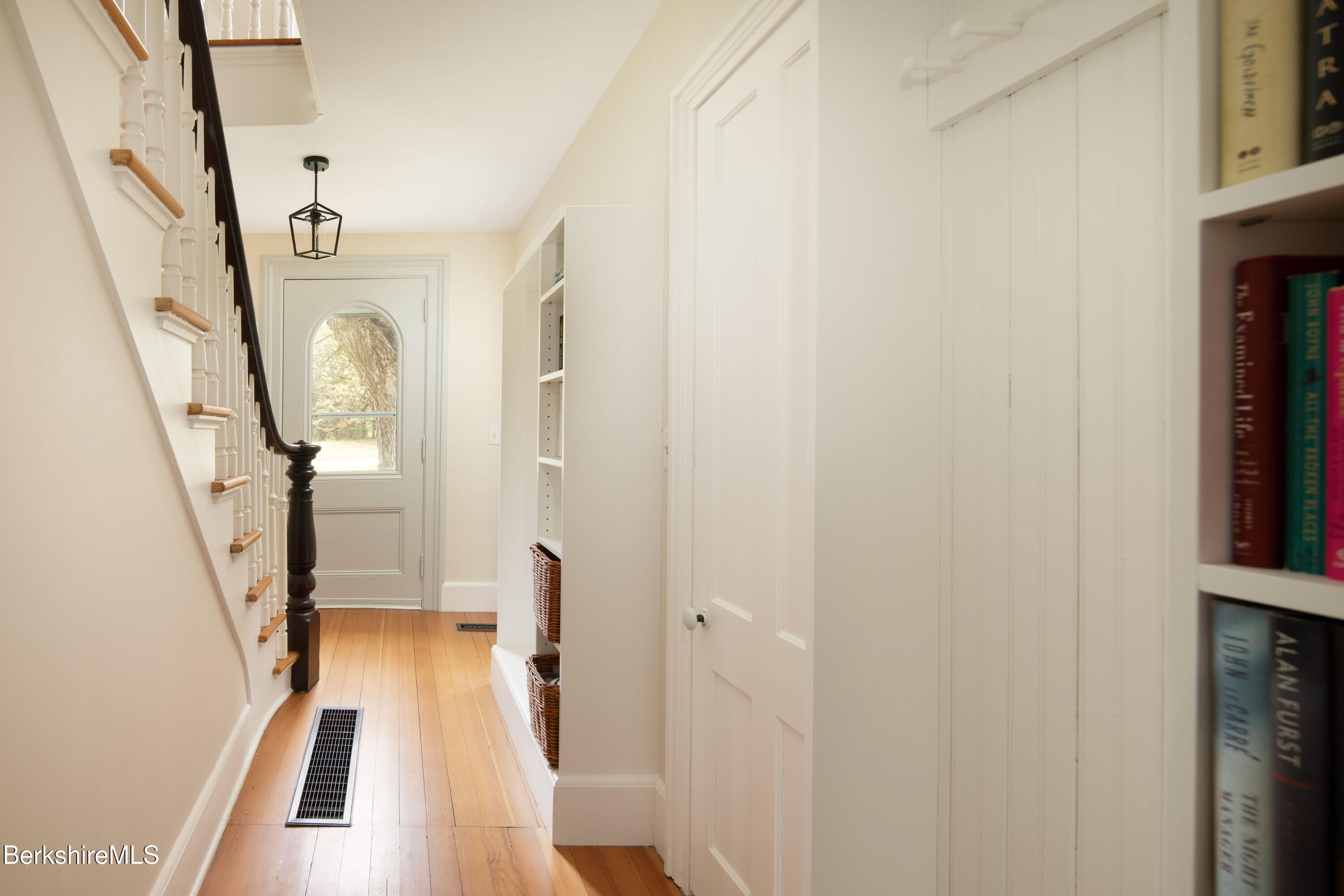 1430 Salisbury Road Sheffield, MA 01257 - Photo 15 of 29 a view of a livingroom from a hall with wooden floor