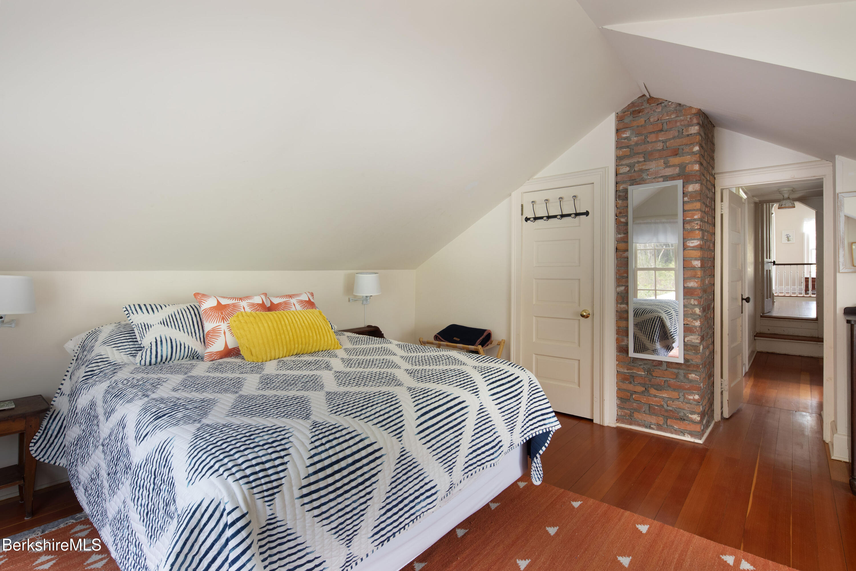 1430 Salisbury Road Sheffield, MA 01257 - Photo 23 of 29 a bedroom with a bed and wooden floor