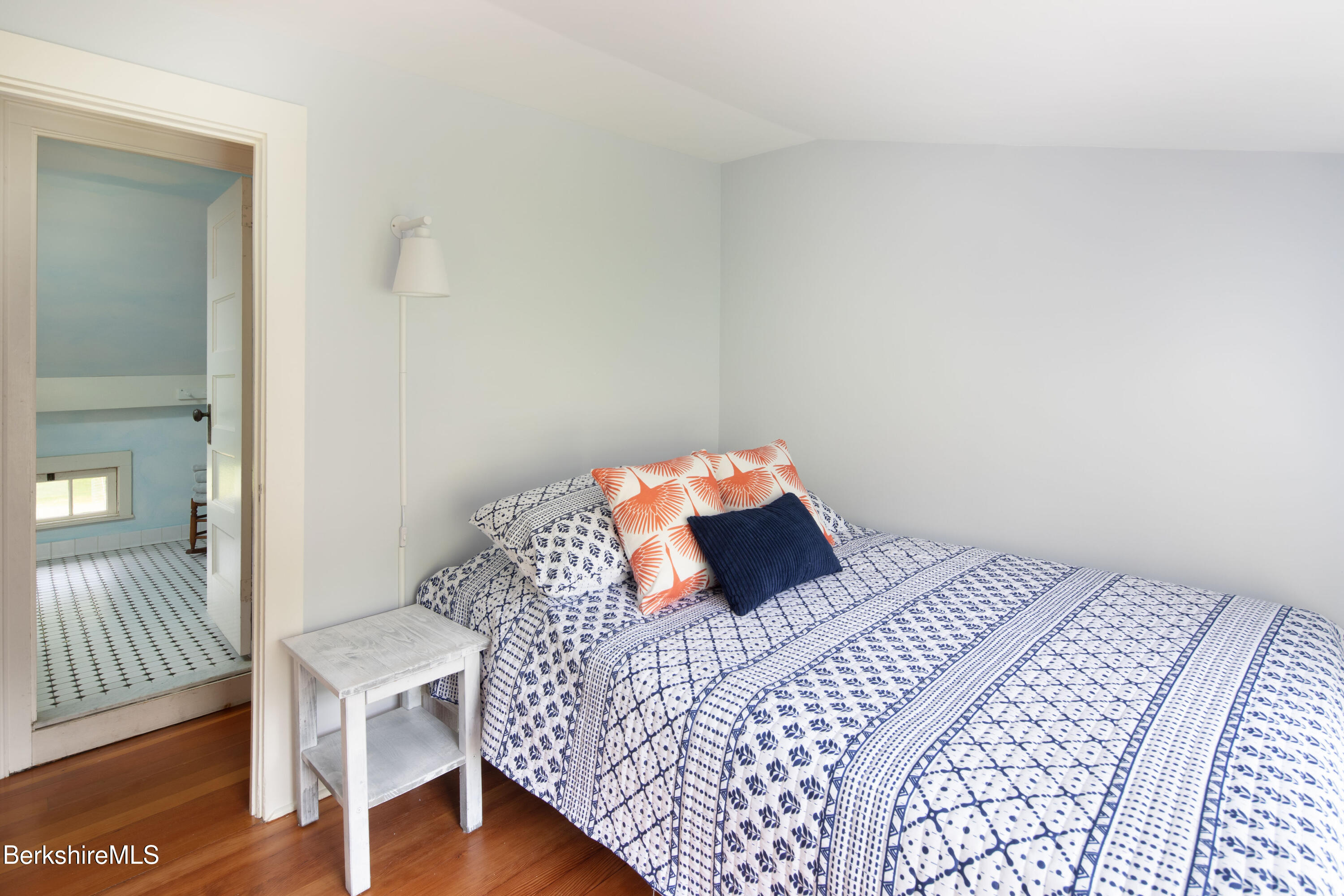 1430 Salisbury Road Sheffield, MA 01257 - Photo 25 of 29 a bedroom with a bed and wooden floor