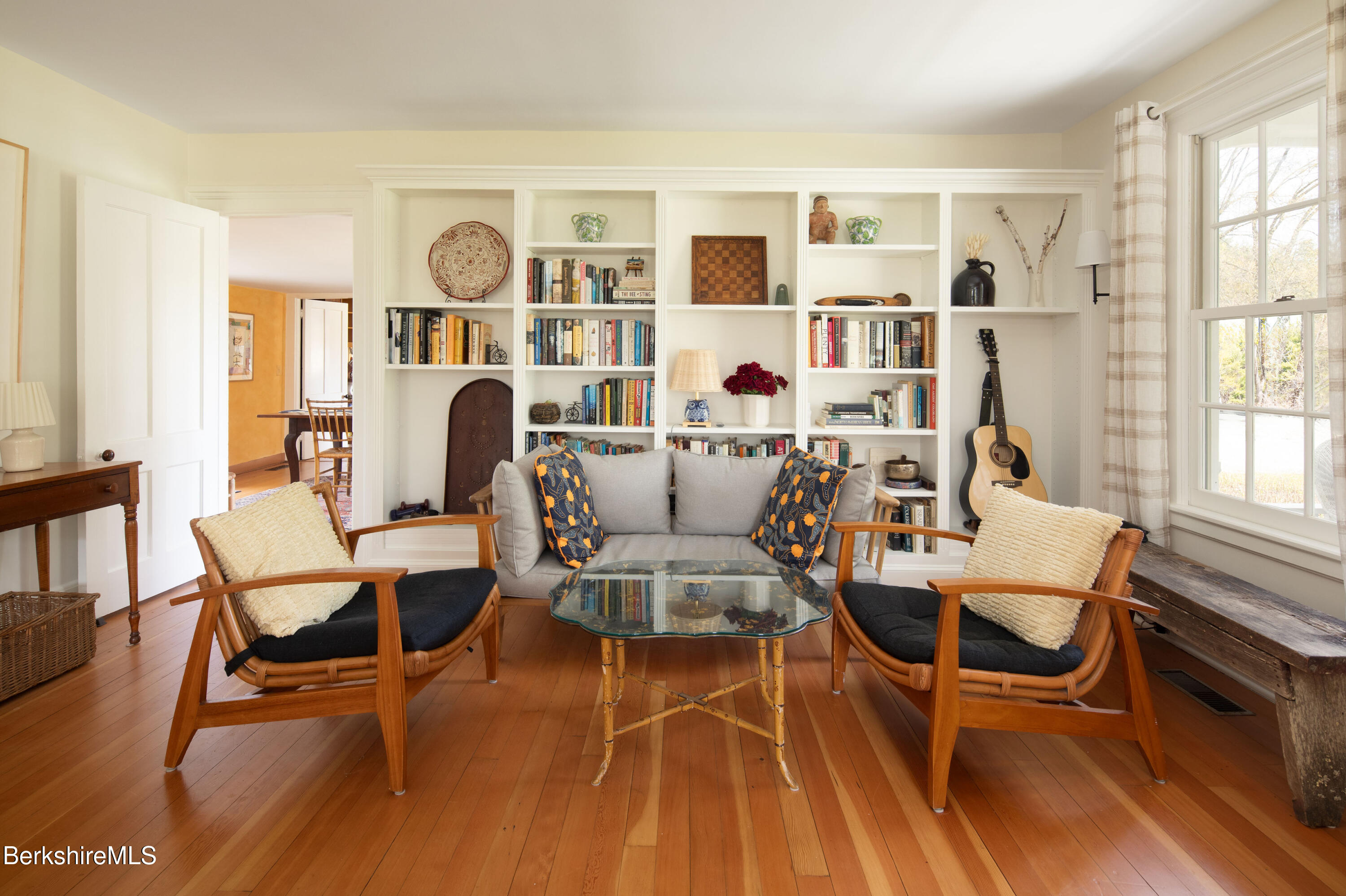 1430 Salisbury Road Sheffield, MA 01257 - Photo 8 of 29 a living room with patio chairs and wooden floor