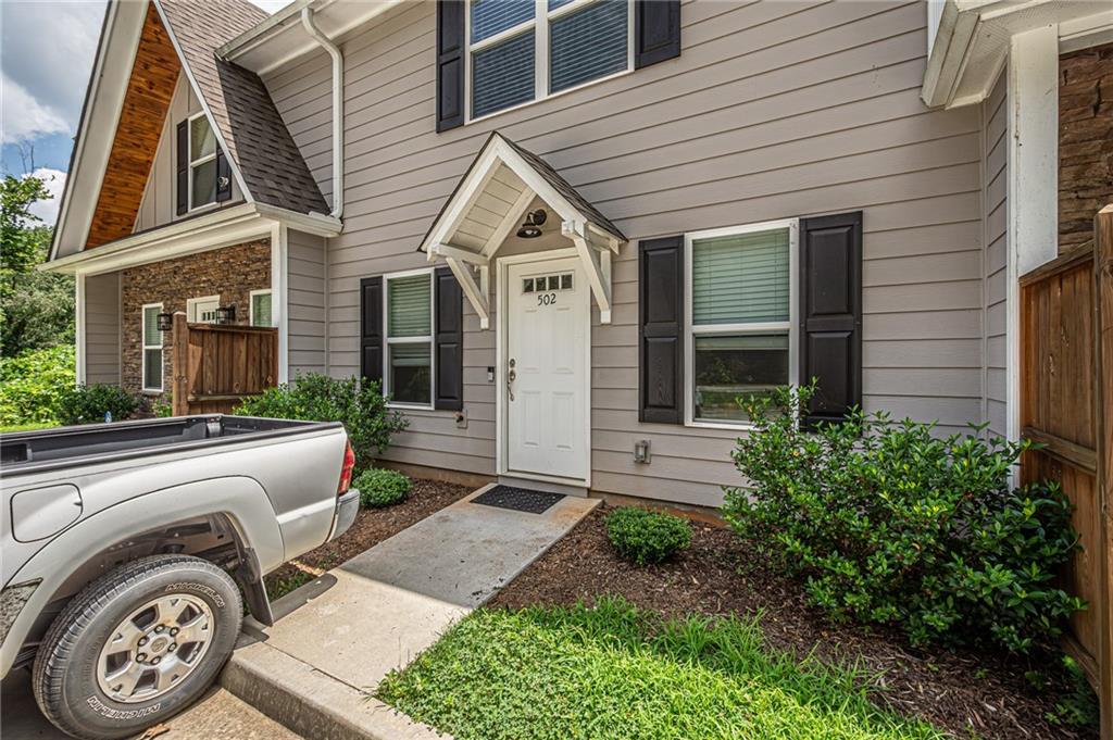502 Wimpy Mill Road Dahlonega, GA 30533 - Photo 30 of 30 a view of a house with a washer and a large window