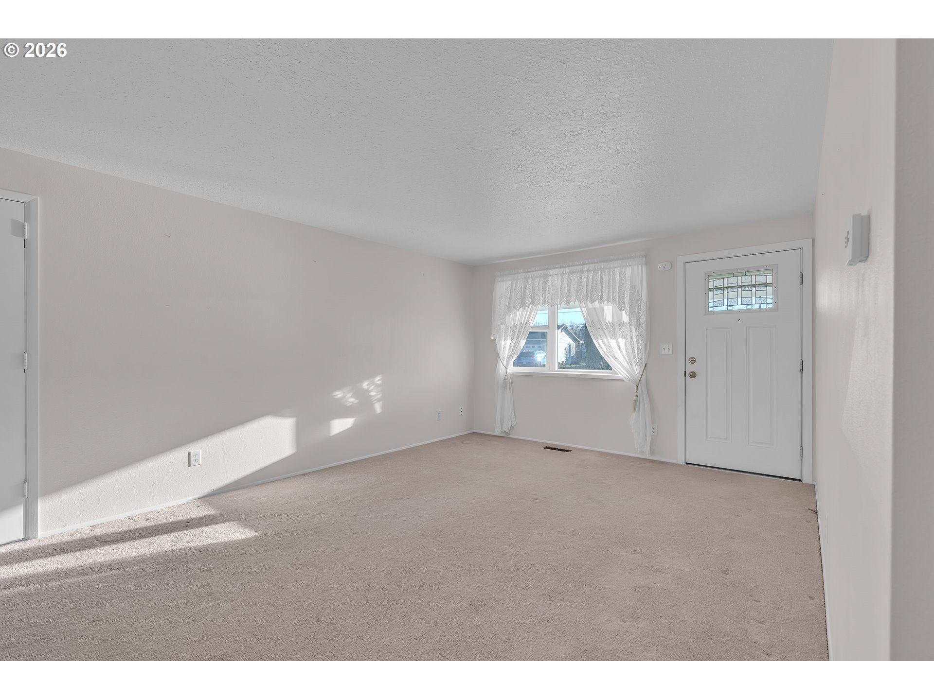 1379 Sallal Road Woodburn, OR 97071 - Photo 14 of 24 a view of an empty room with a window