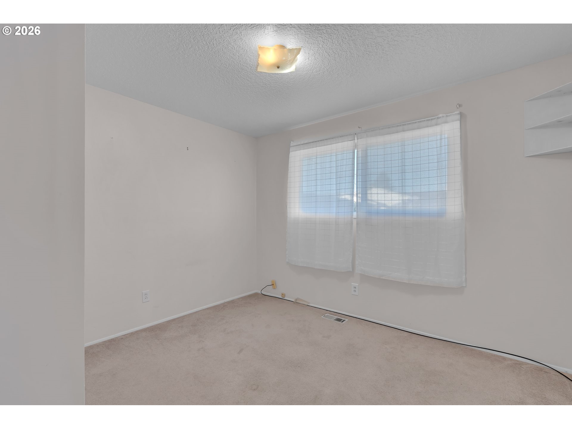 1379 Sallal Road Woodburn, OR 97071 - Photo 19 of 24 an empty room with windows