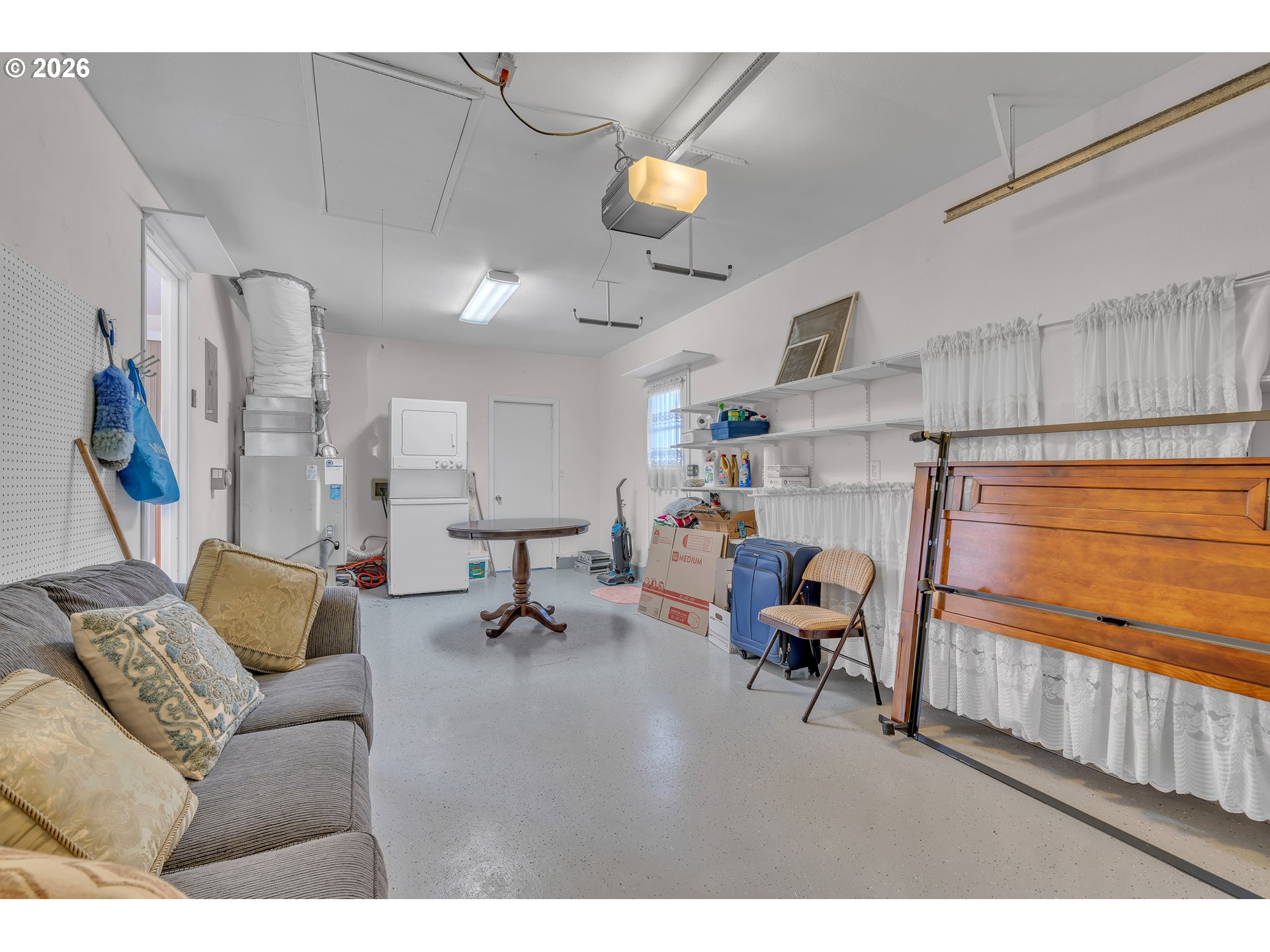 1379 Sallal Road Woodburn, OR 97071 - Photo 21 of 24 a living room with furniture and a chandelier