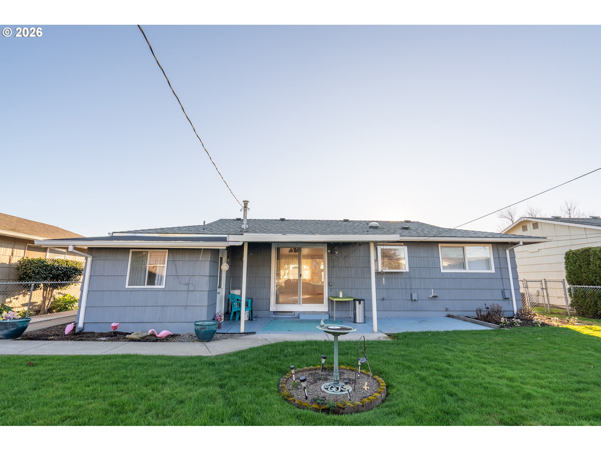 1379 Sallal Road Woodburn, OR 97071 - Photo 5 of 24 a front view of a house with a yard