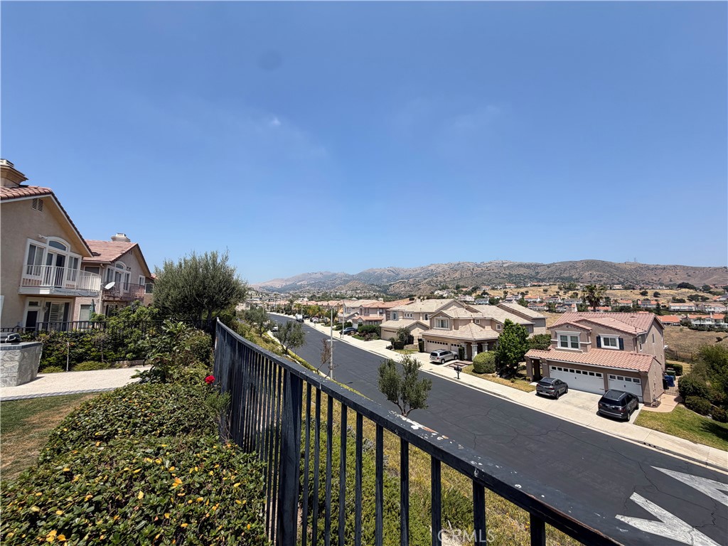 19823 Mariposa Pines Way Porter Ranch, CA 91326 - Photo 6 of 50 a view of a city from a balcony