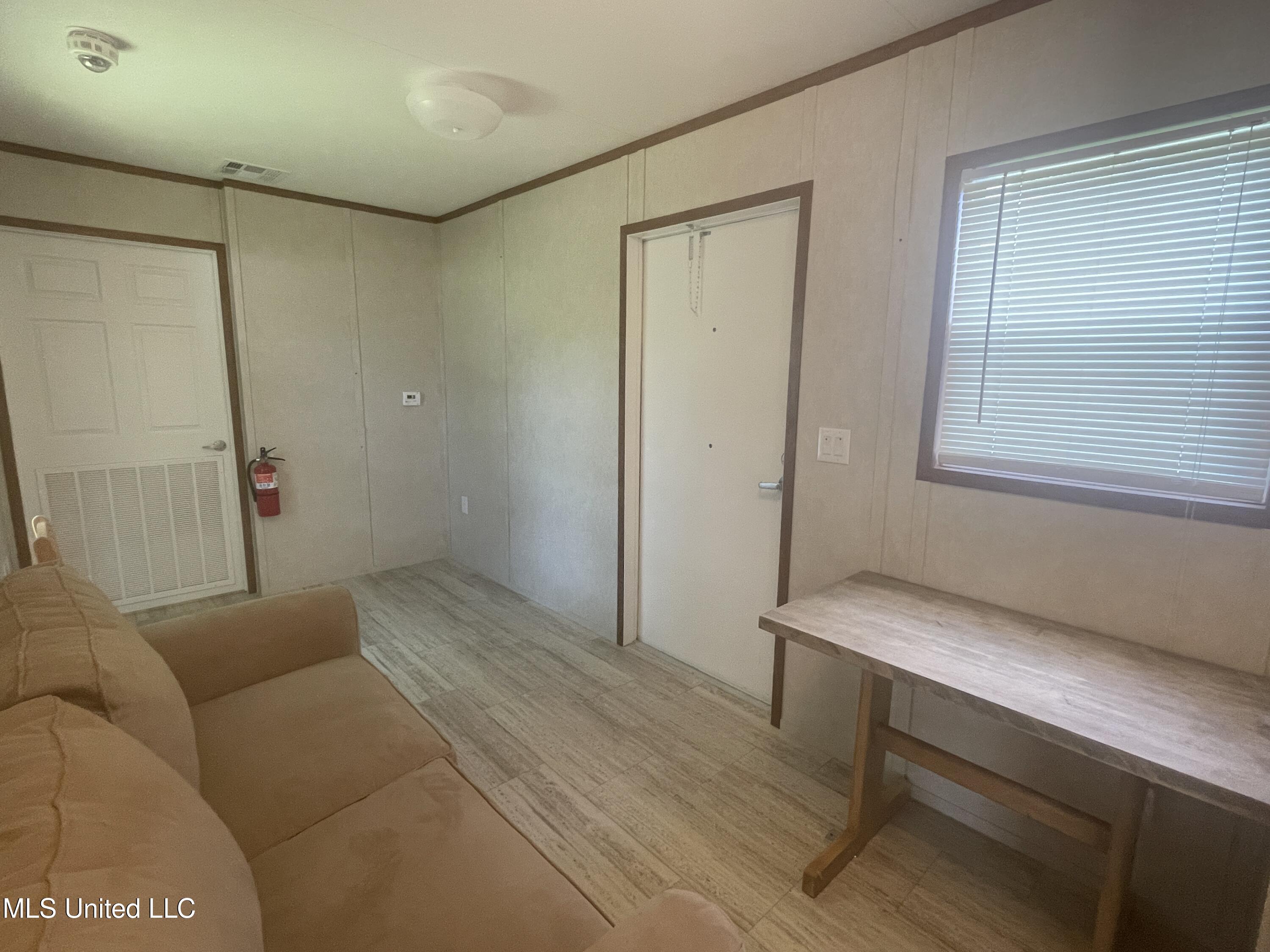 12465 Canal Road, Unit B Gulfport, MS 39503 - Photo 4 of 13 IMG_2876