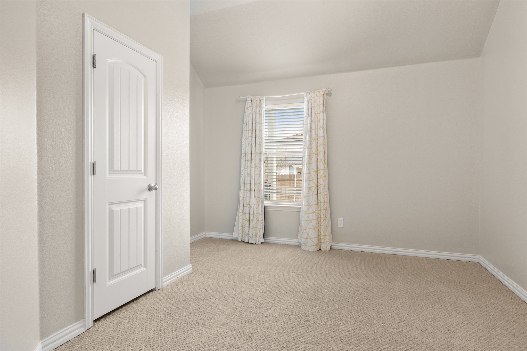 249 Saffron Springs Buda, TX 78610 - Photo 19 of 21 an empty room with windows