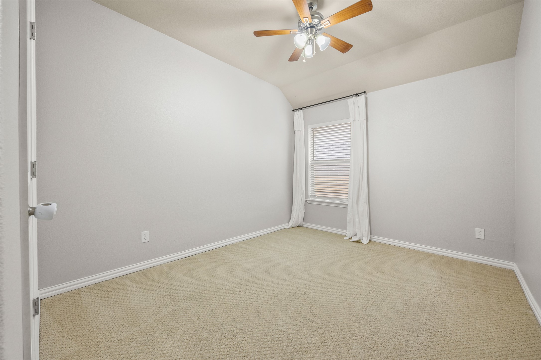 249 Saffron Springs Buda, TX 78610 - Photo 20 of 21 a view of an empty room with a fan