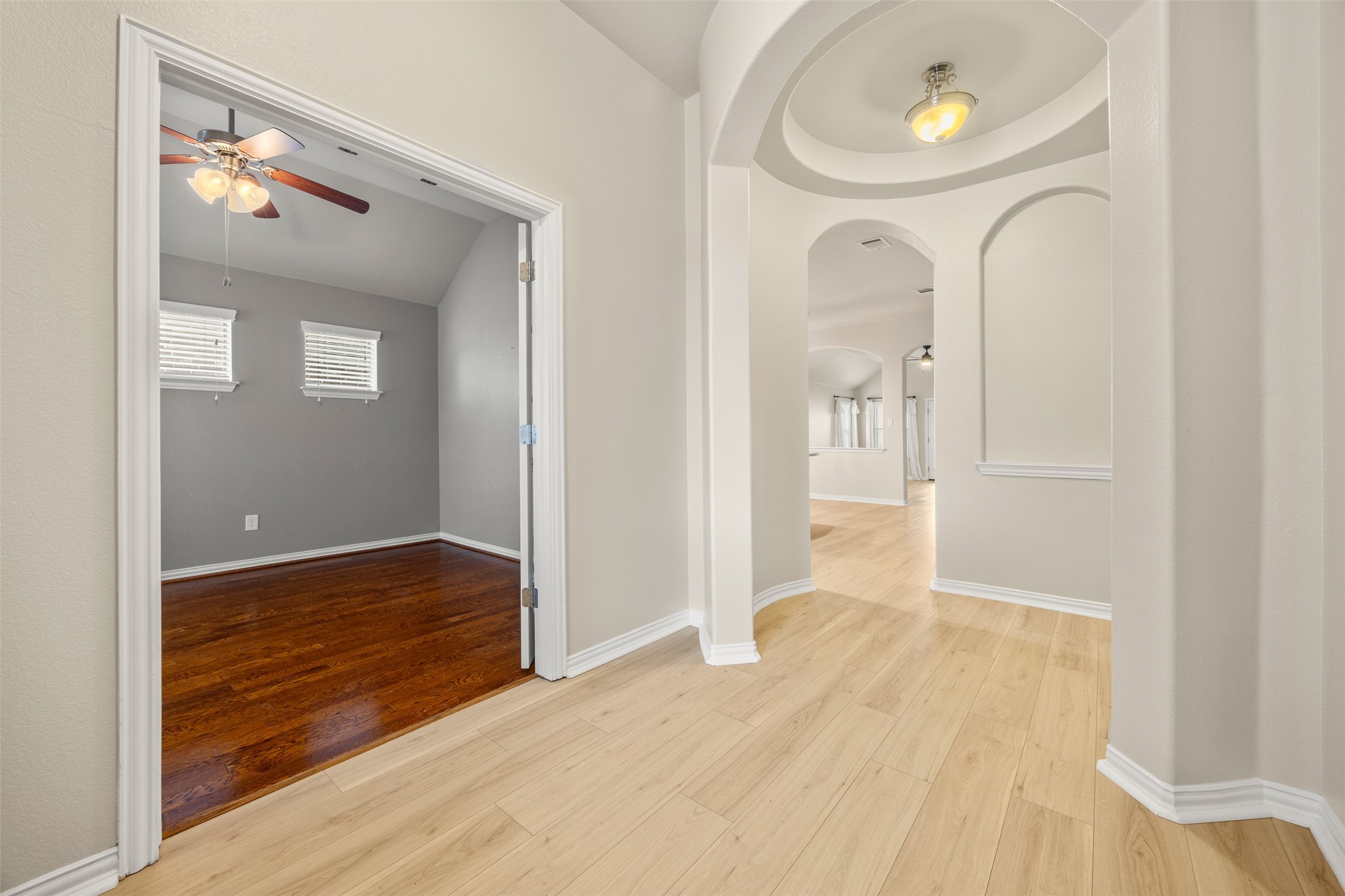249 Saffron Springs Buda, TX 78610 - Photo 5 of 21 a view of empty room with wooden floor