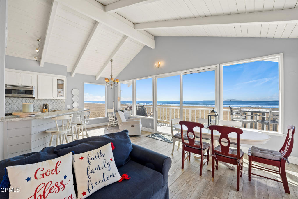 2405 Ocean Drive Oxnard, CA 93035 - Photo 26 of 40 a living room with furniture kitchen view and a large window
