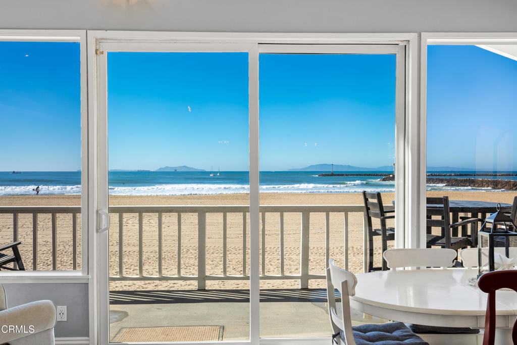2405 Ocean Drive Oxnard, CA 93035 - Photo 7 of 40 a view of a living room with a furniture and floor to ceiling window