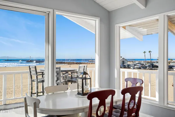 a view of a dining room with furniture window and outside view