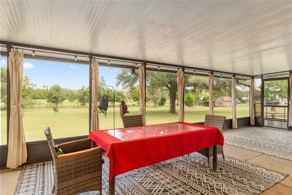 a view of a house with a yard and garage