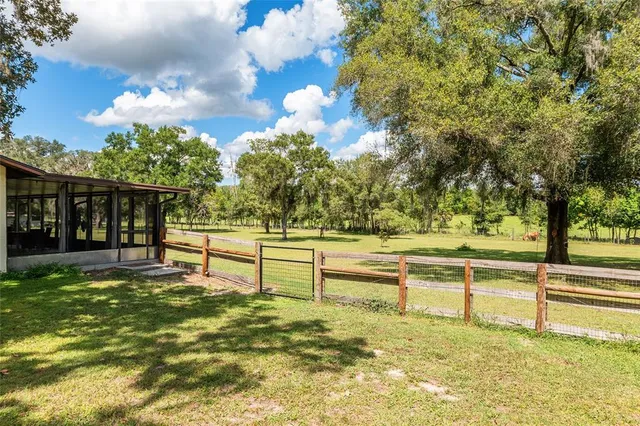 a view of a lake and a yard