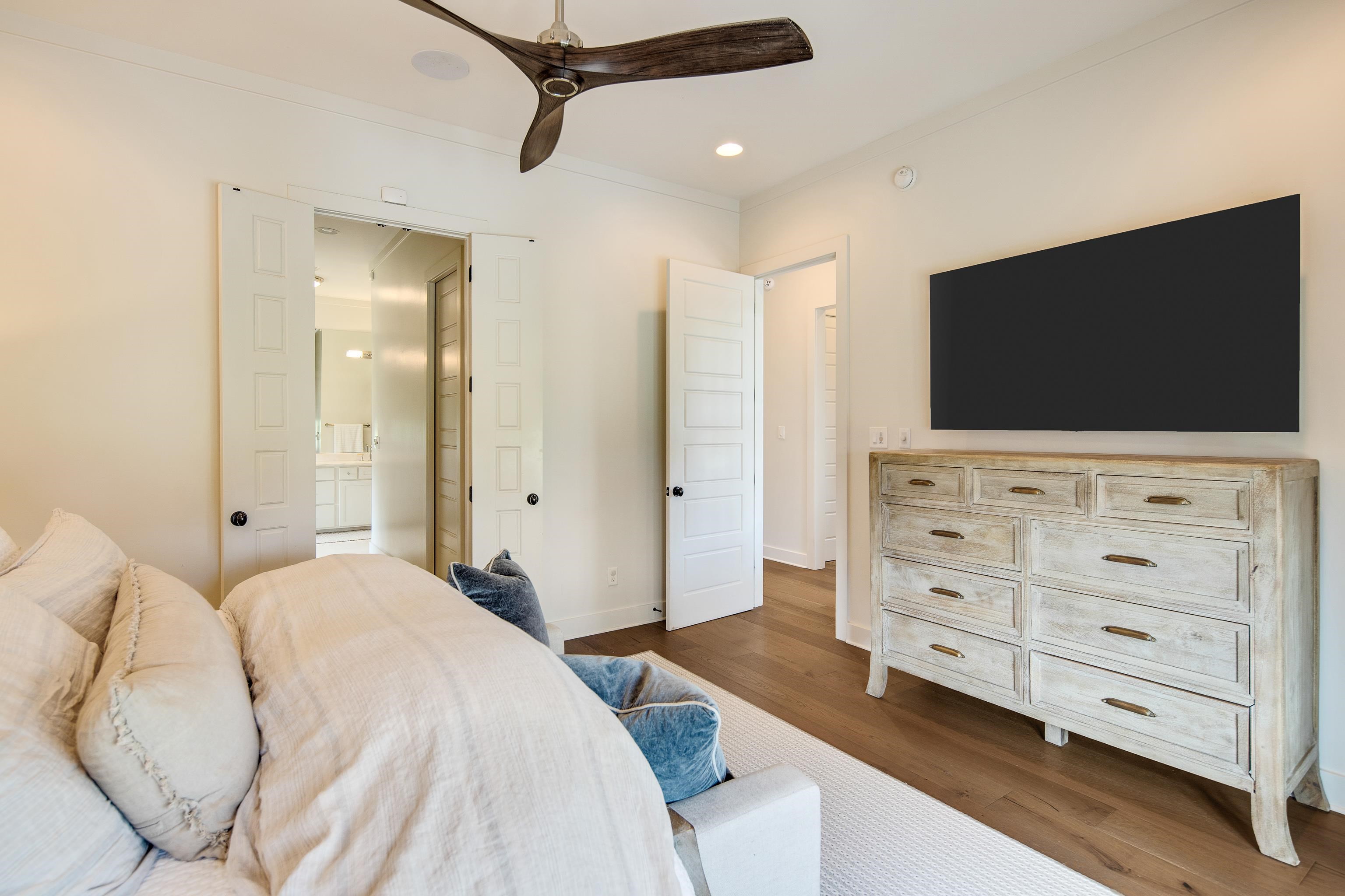 1480 Frank Road Collierville, TN 38017 - Photo 12 of 39 a bedroom with a bed and a flat screen tv