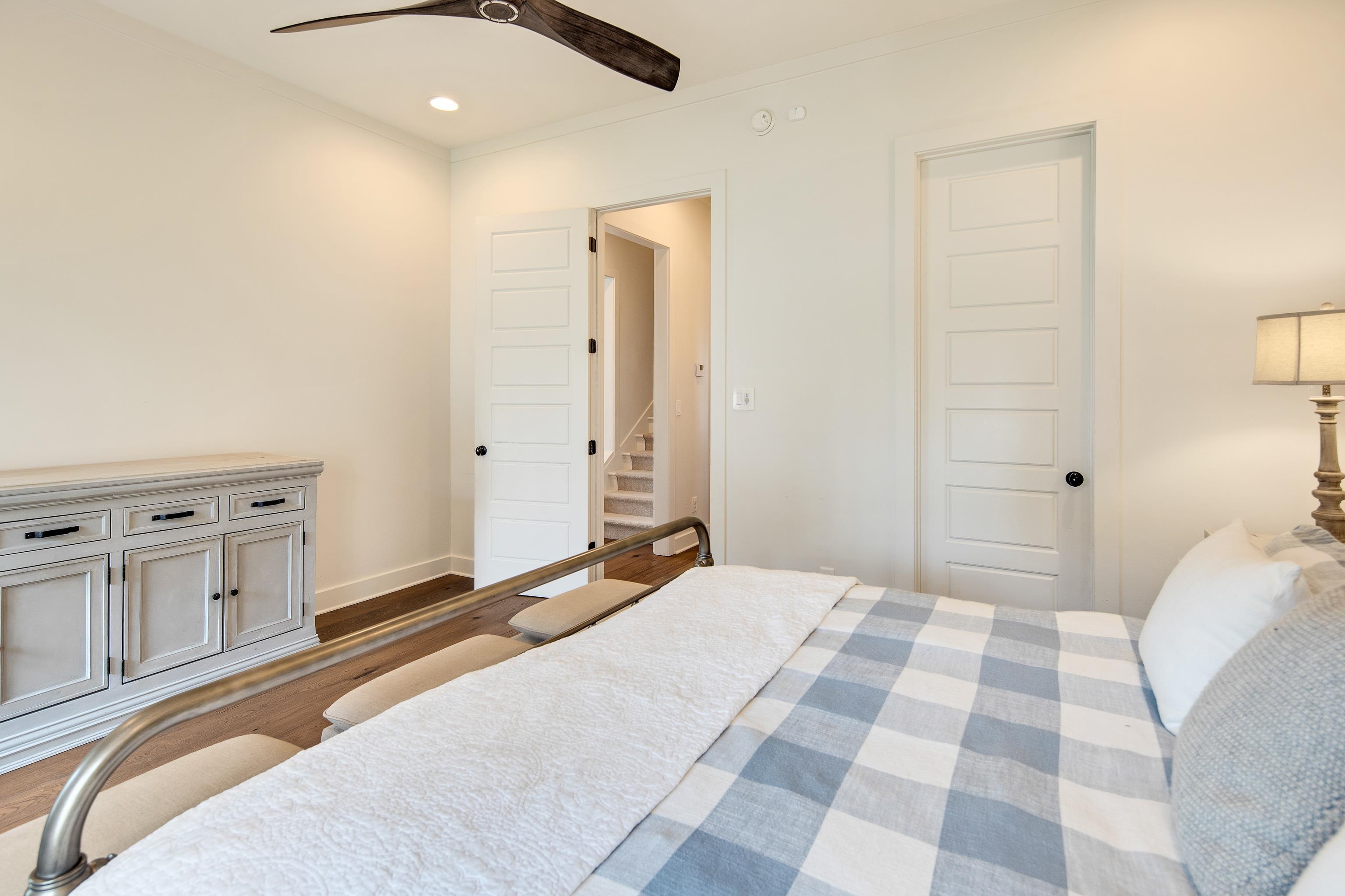 1480 Frank Road Collierville, TN 38017 - Photo 16 of 39 a bedroom with a bed and a cabinets