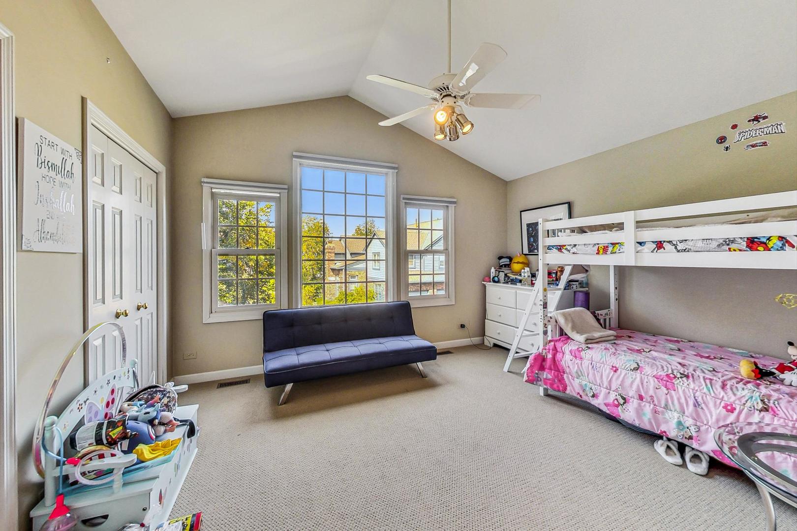 74 Trent Court Burr Ridge, IL 60527 - Photo 16 of 30 a bedroom with bed and windows