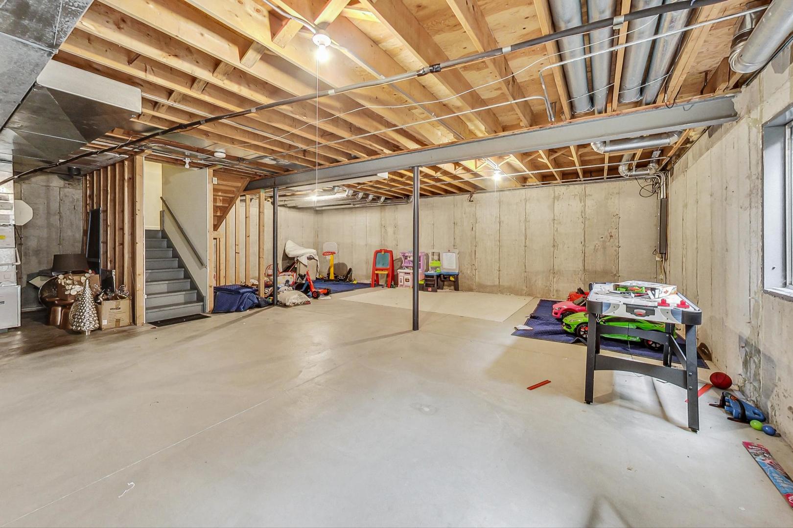 74 Trent Court Burr Ridge, IL 60527 - Photo 20 of 30 a view of a room with gym equipment