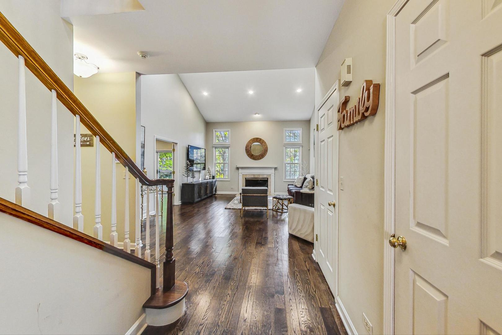 74 Trent Court Burr Ridge, IL 60527 - Photo 2 of 30 a view of entryway with livingroom and wooden floor