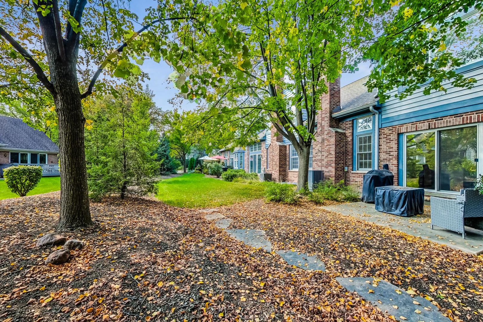 74 Trent Court Burr Ridge, IL 60527 - Photo 24 of 30 a view of a house with backyard and sitting area