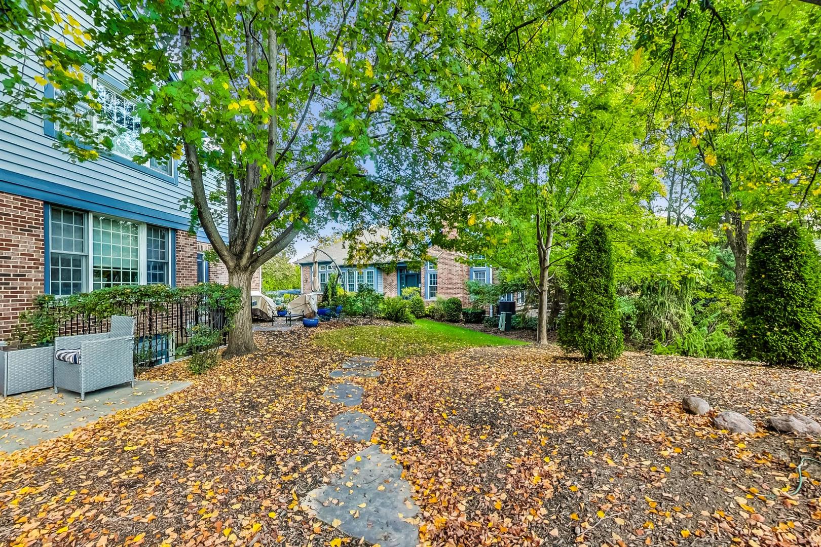 74 Trent Court Burr Ridge, IL 60527 - Photo 25 of 30 a view of a house with a tree in front