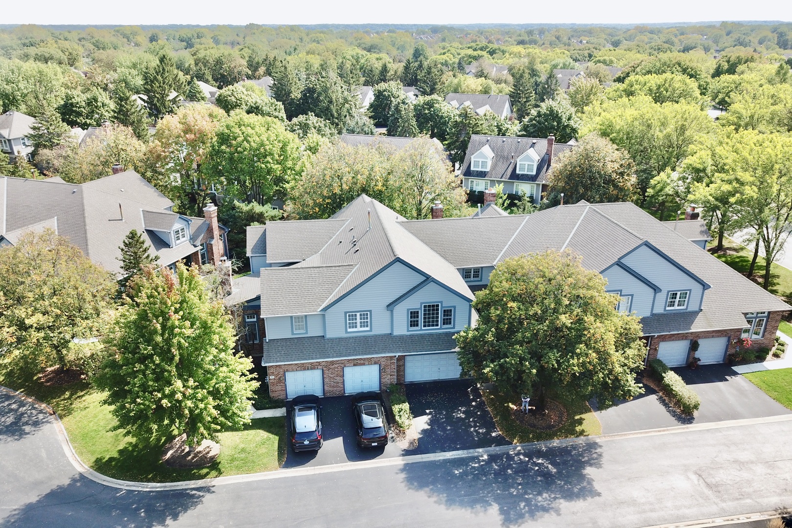 74 Trent Court Burr Ridge, IL 60527 - Photo 26 of 30 an aerial view of a house with yard and green space