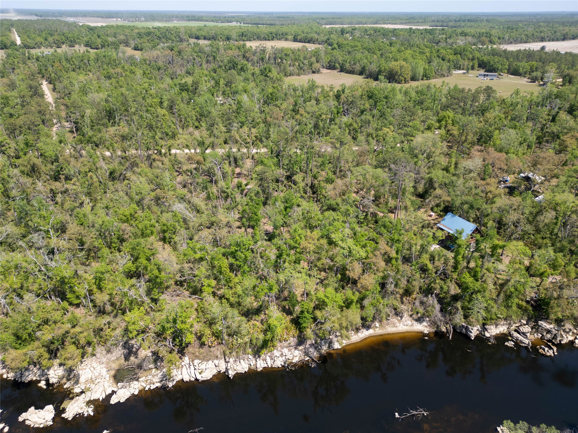 0 Southwest 77th Terrace Jasper, FL 32052 - Photo 6 of 13 an aerial view of a houses with yard