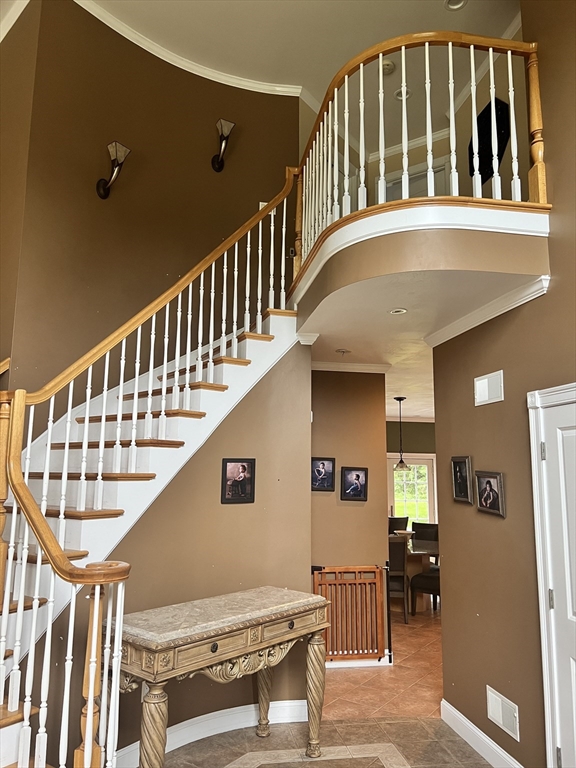 34 Base Lodge Road Swansea, MA 02777 - Photo 19 of 35 a view of staircase with lots of furniture and a wooden floor