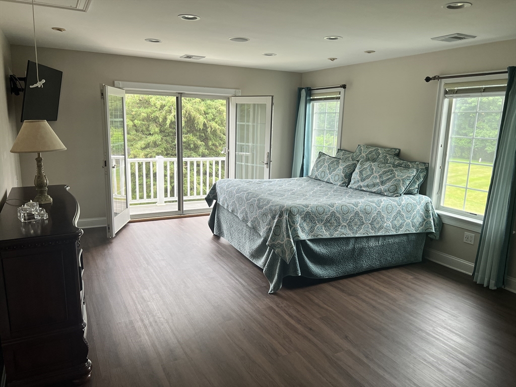 34 Base Lodge Road Swansea, MA 02777 - Photo 31 of 35 a bedroom with a bed and a large window