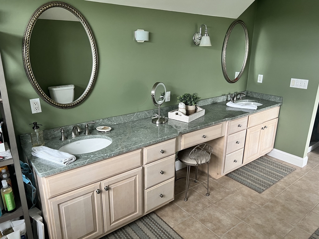 34 Base Lodge Road Swansea, MA 02777 - Photo 34 of 35 a bathroom with a granite countertop double vanity sink and a mirror