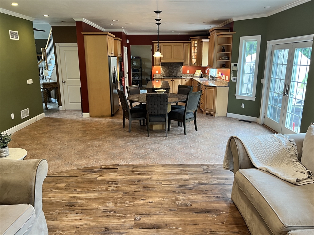 34 Base Lodge Road Swansea, MA 02777 - Photo 9 of 35 a view of a dining room with furniture and chandelier