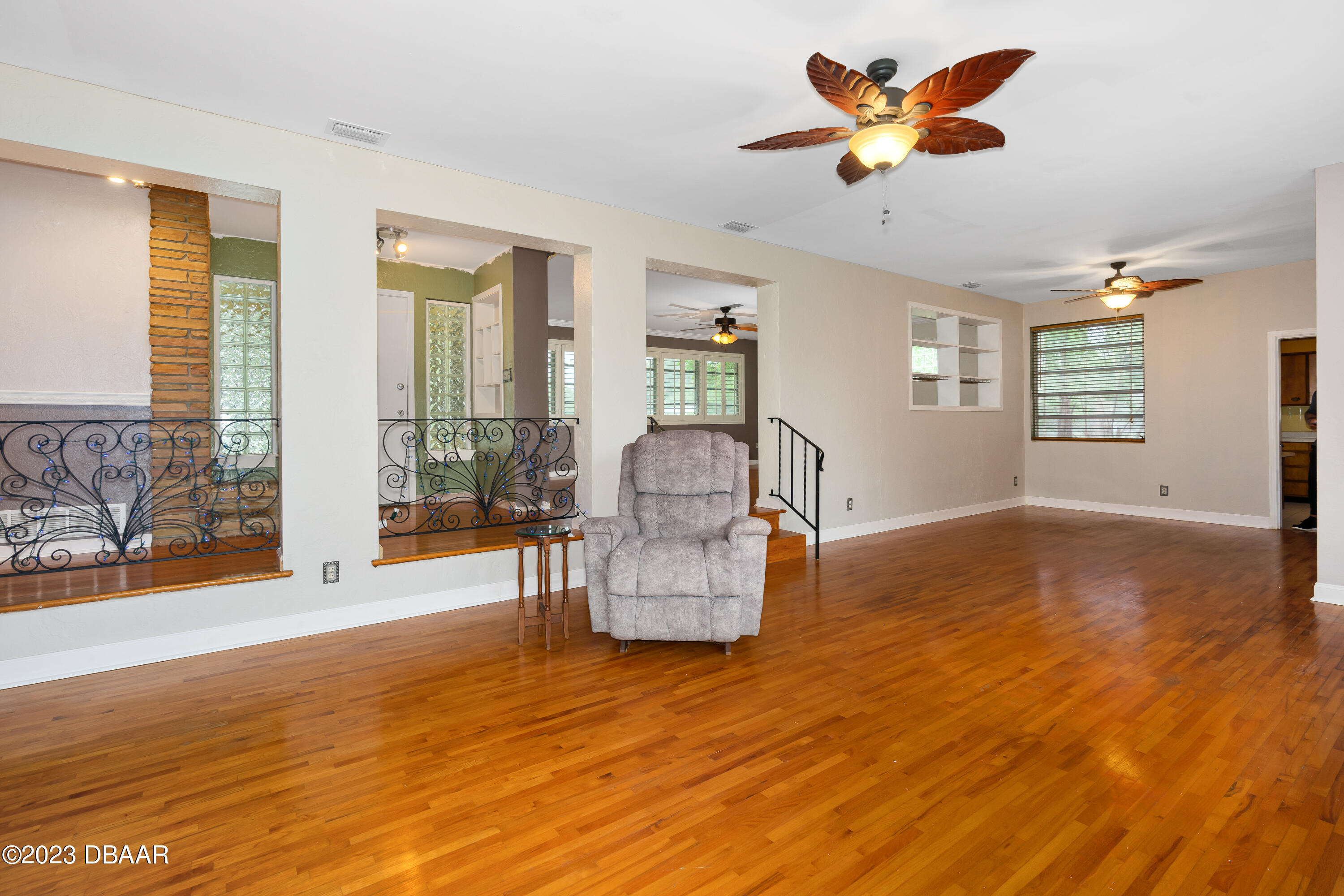 267 South Halifax Drive Ormond Beach, FL 32176 - Photo 18 of 47 a living room with furniture and a large window