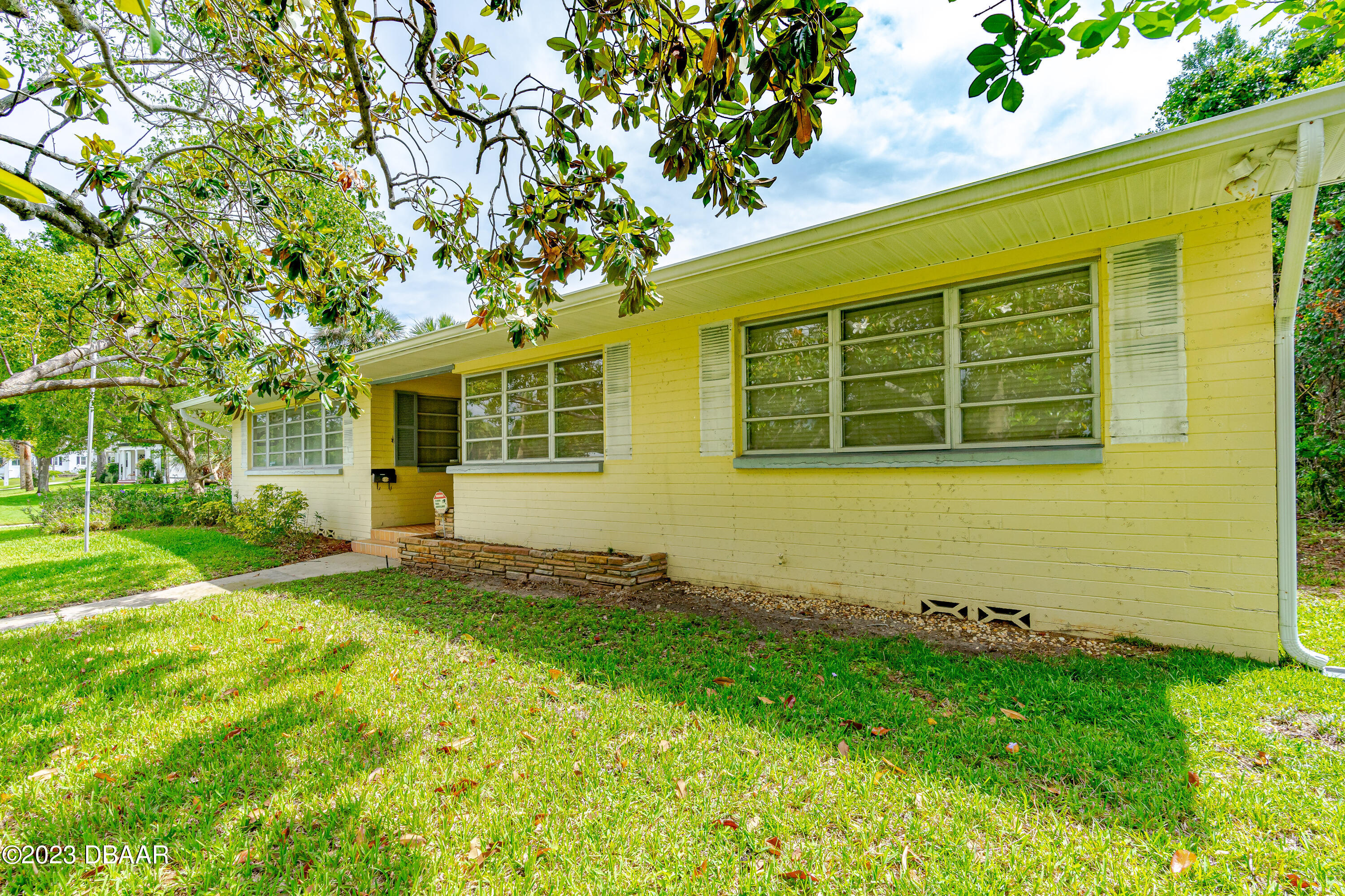 267 South Halifax Drive Ormond Beach, FL 32176 - Photo 3 of 47 a view of a house with a backyard