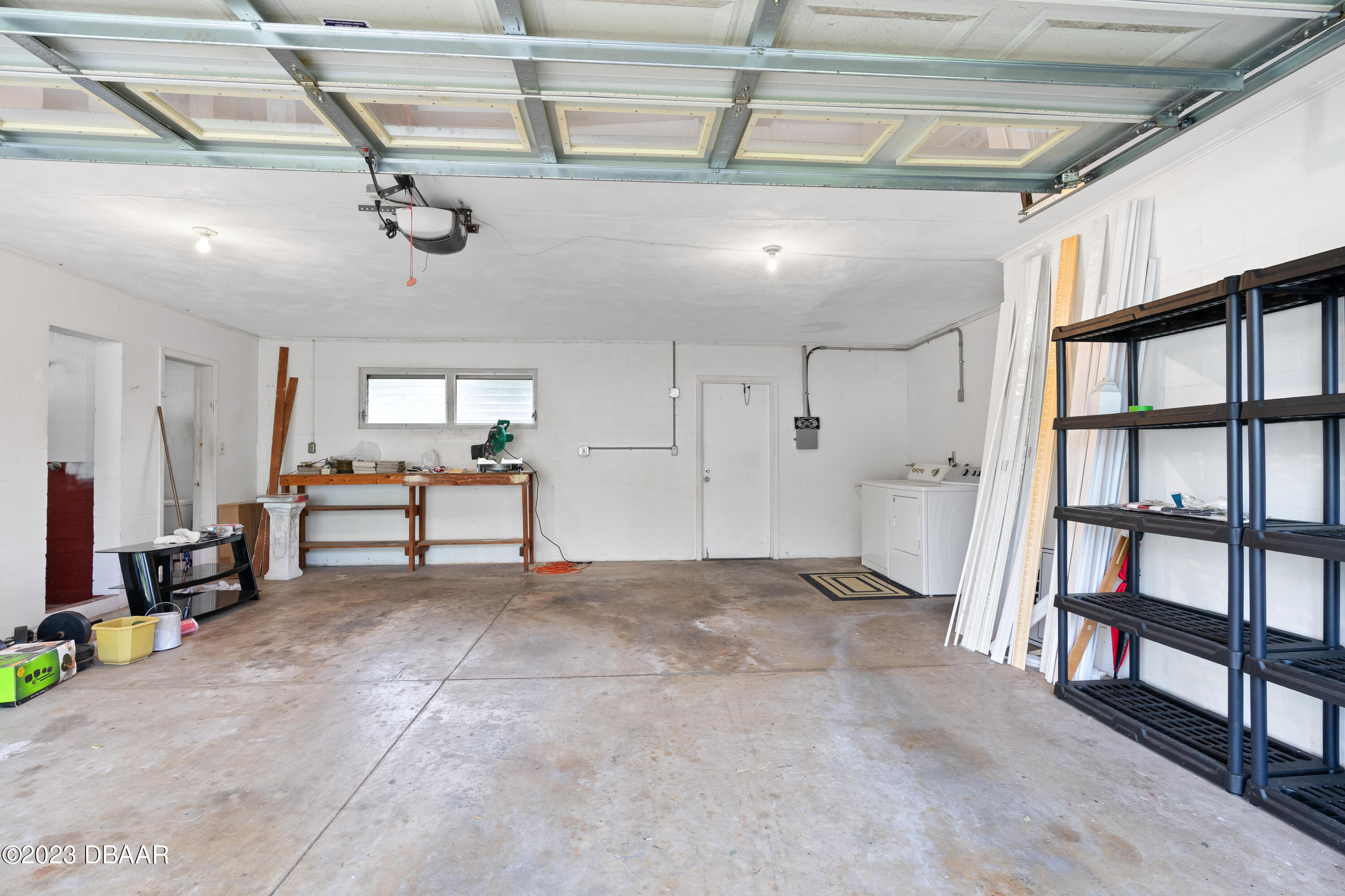 267 South Halifax Drive Ormond Beach, FL 32176 - Photo 34 of 47 a view of a livingroom with furniture and a window