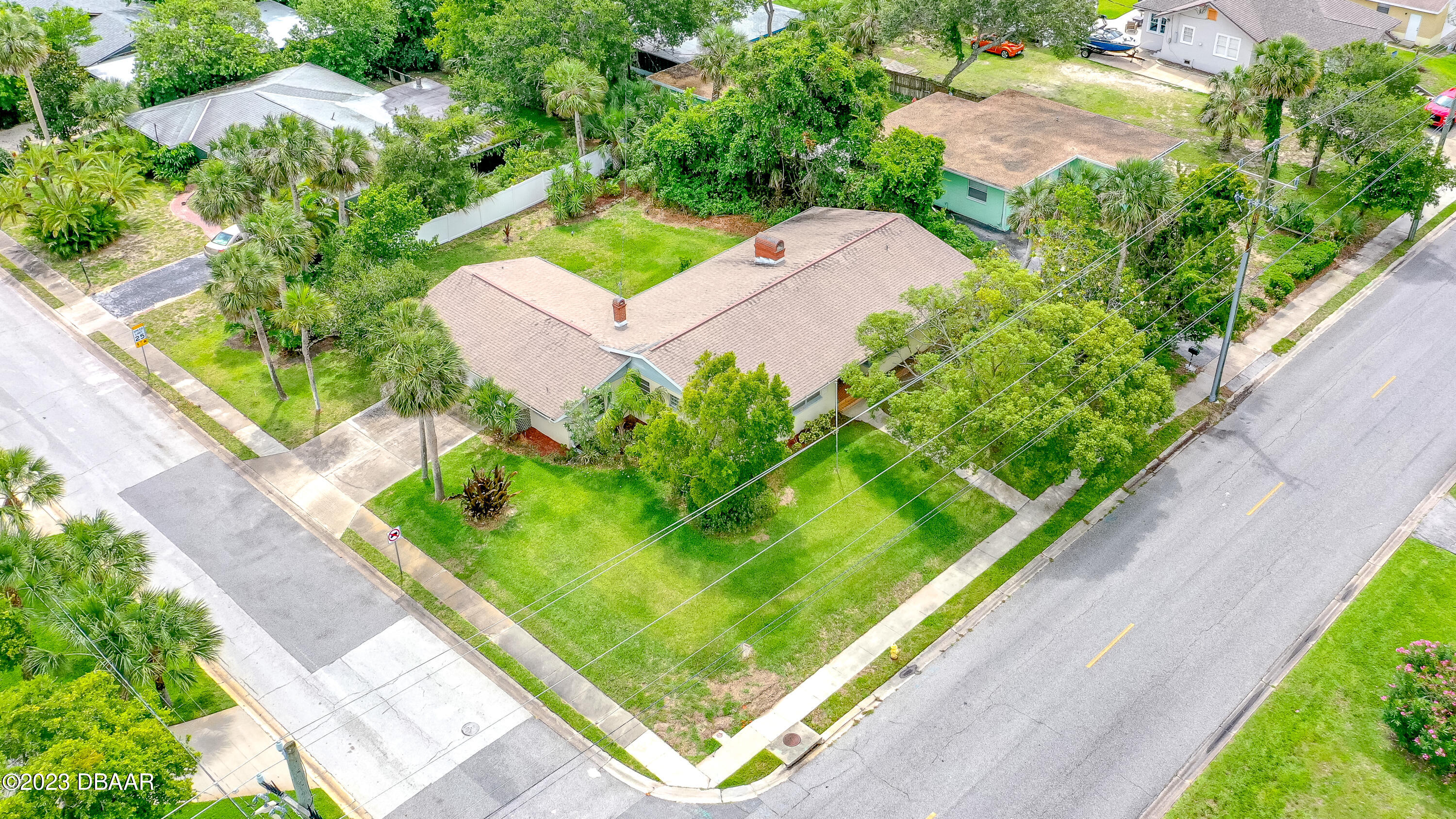 267 South Halifax Drive Ormond Beach, FL 32176 - Photo 40 of 47 a view of a yard with potted plants