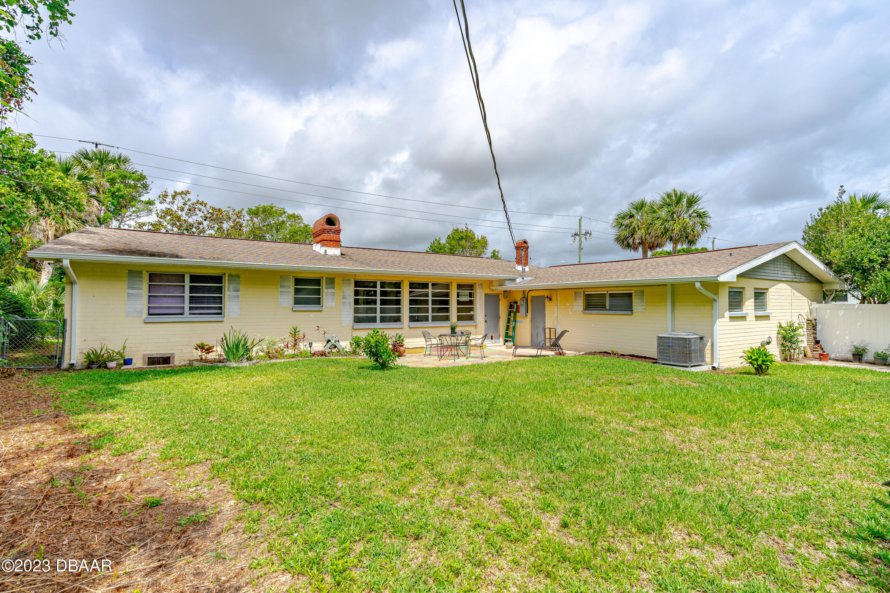 267 South Halifax Drive Ormond Beach, FL 32176 - Photo 9 of 47 a front view of house with yard and green space