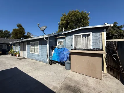 a front view of a house with yard