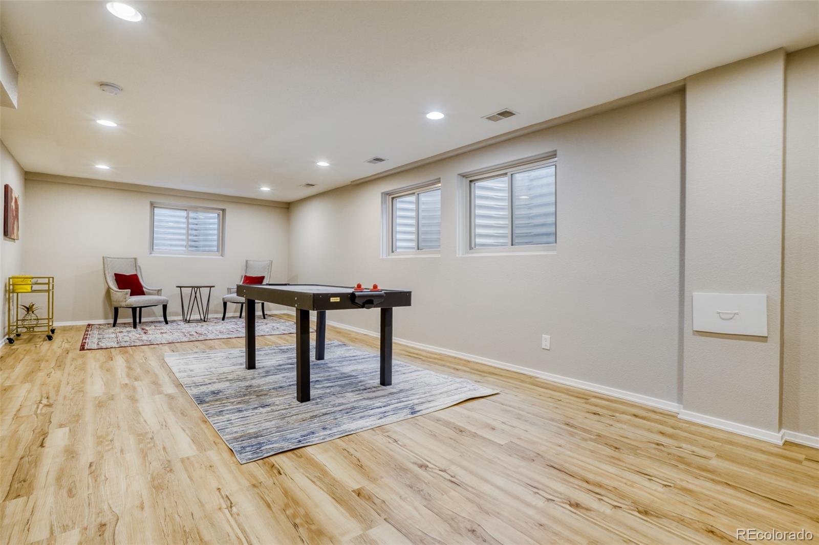 2682 South Quintero Way Aurora, CO 80013 - Photo 21 of 25 a view of a livingroom with furniture and wooden floor