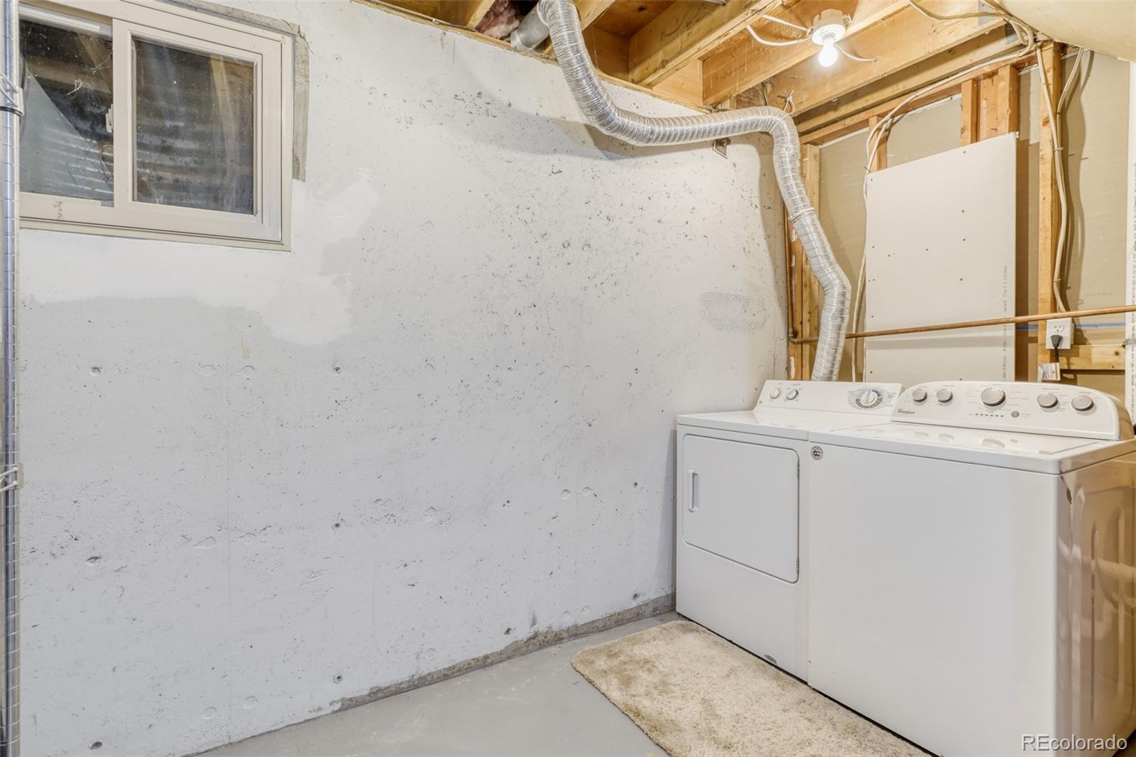 2682 South Quintero Way Aurora, CO 80013 - Photo 23 of 25 a bathroom with a sink and a mirror