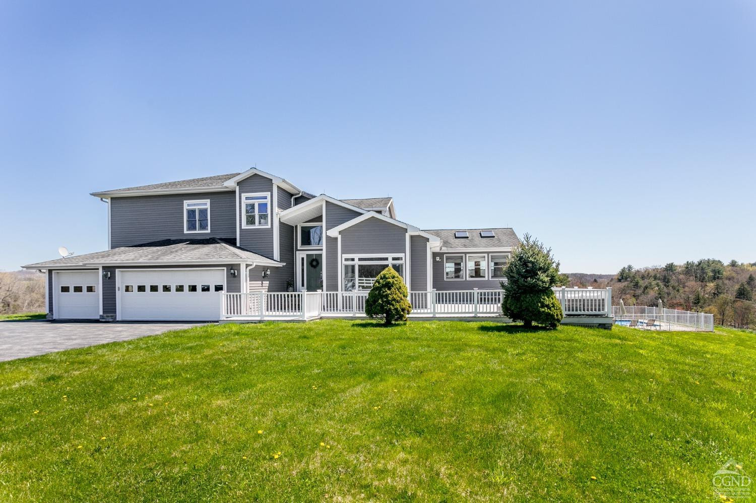 742 Embought Road Catskill, NY 12414 - Photo 2 of 32 a view of a house with a big yard and large trees